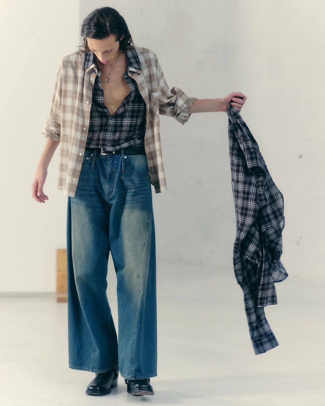 aging twisted denim pants