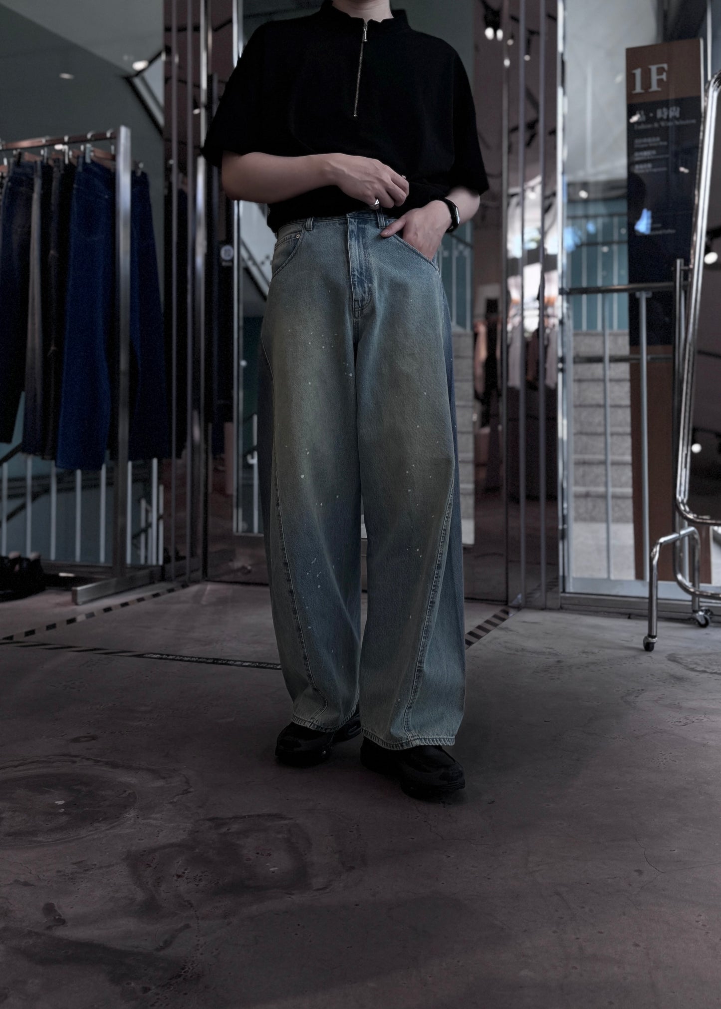 aging twisted denim pants