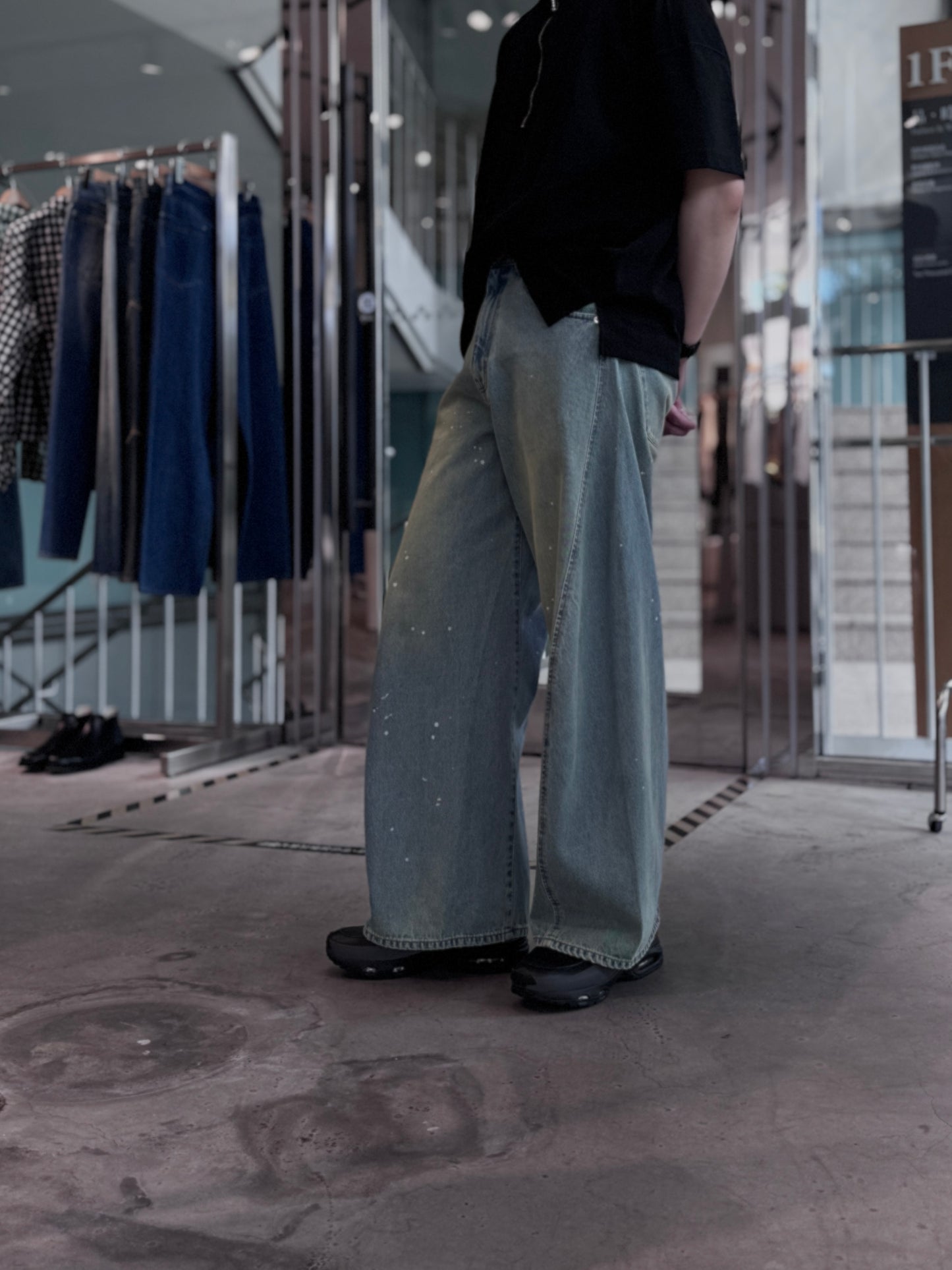 aging twisted denim pants