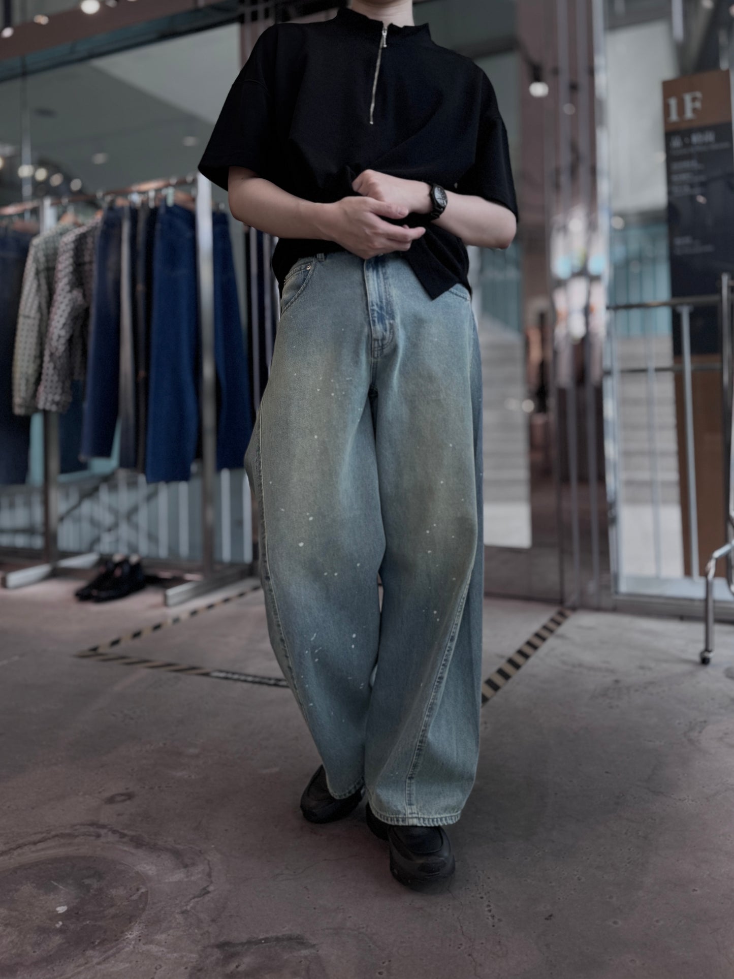 aging twisted denim pants