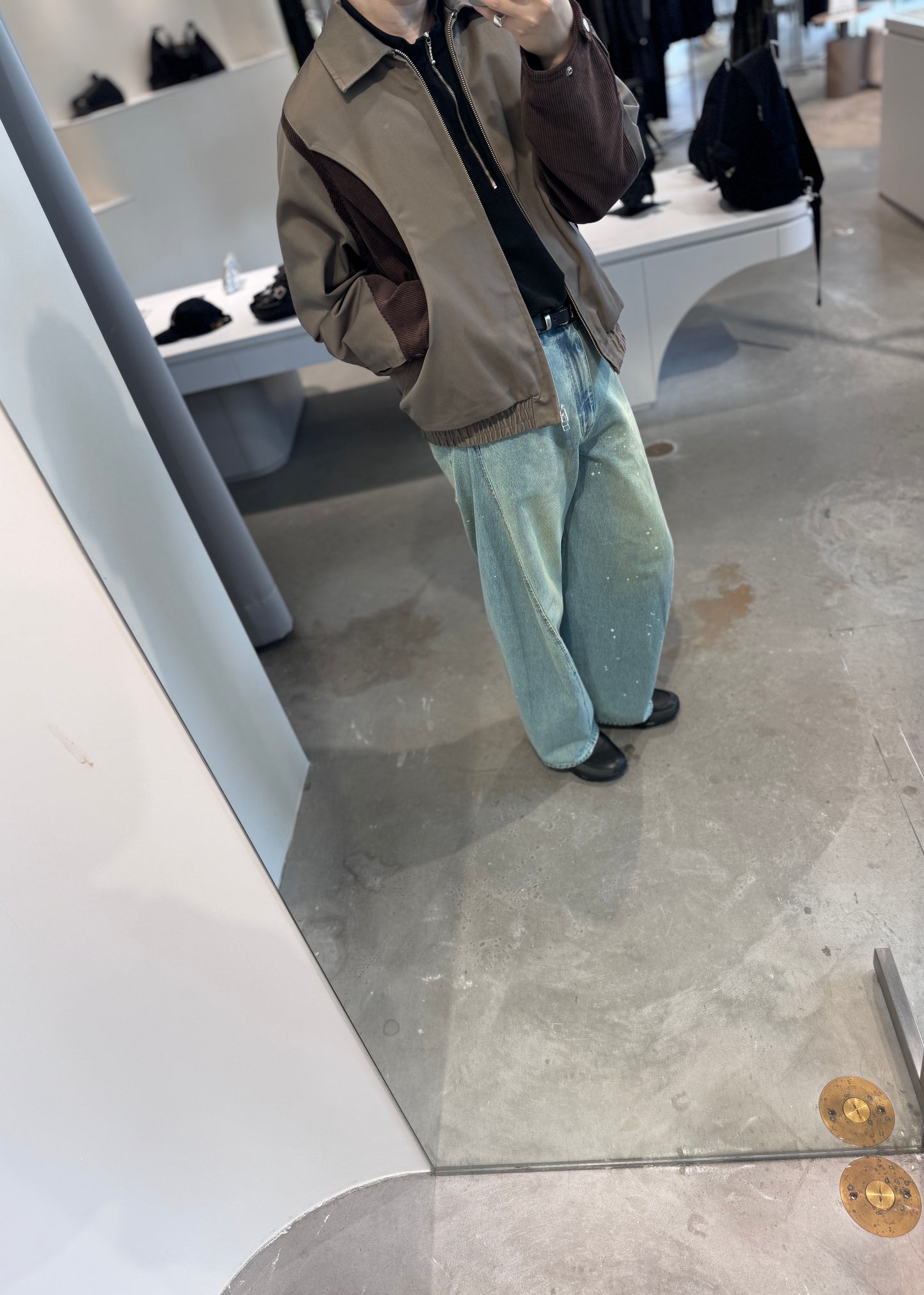 aging twisted denim pants