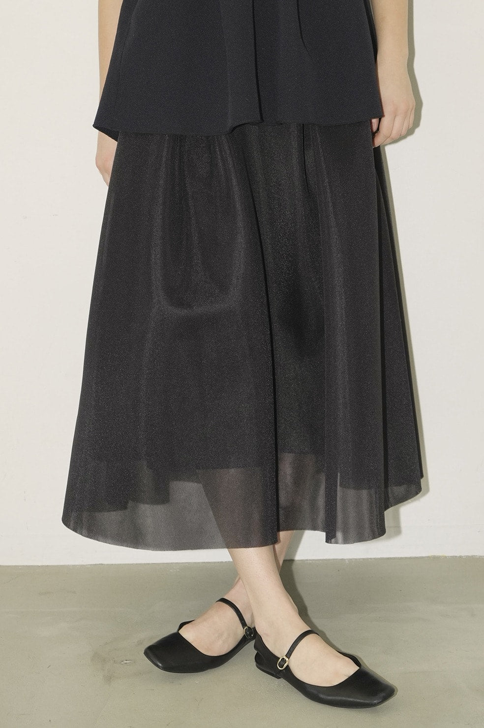 sheer russell volume flare skirt