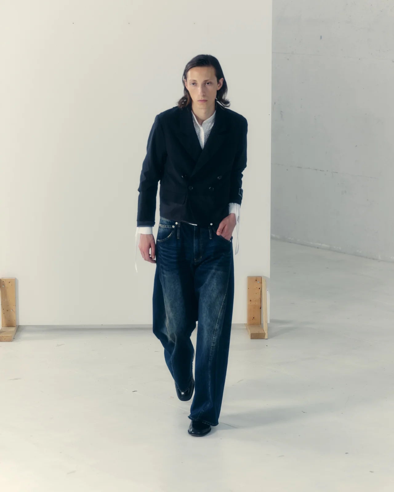 aging twisted denim pants
