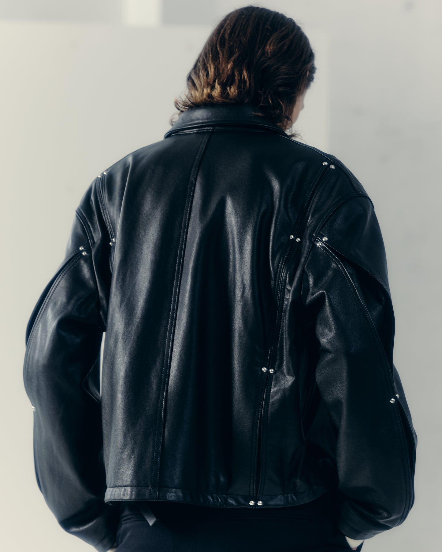 studded motion pleat leather jacket