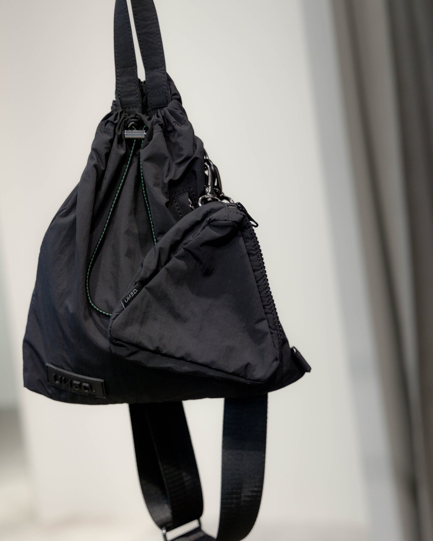 compact sling bag