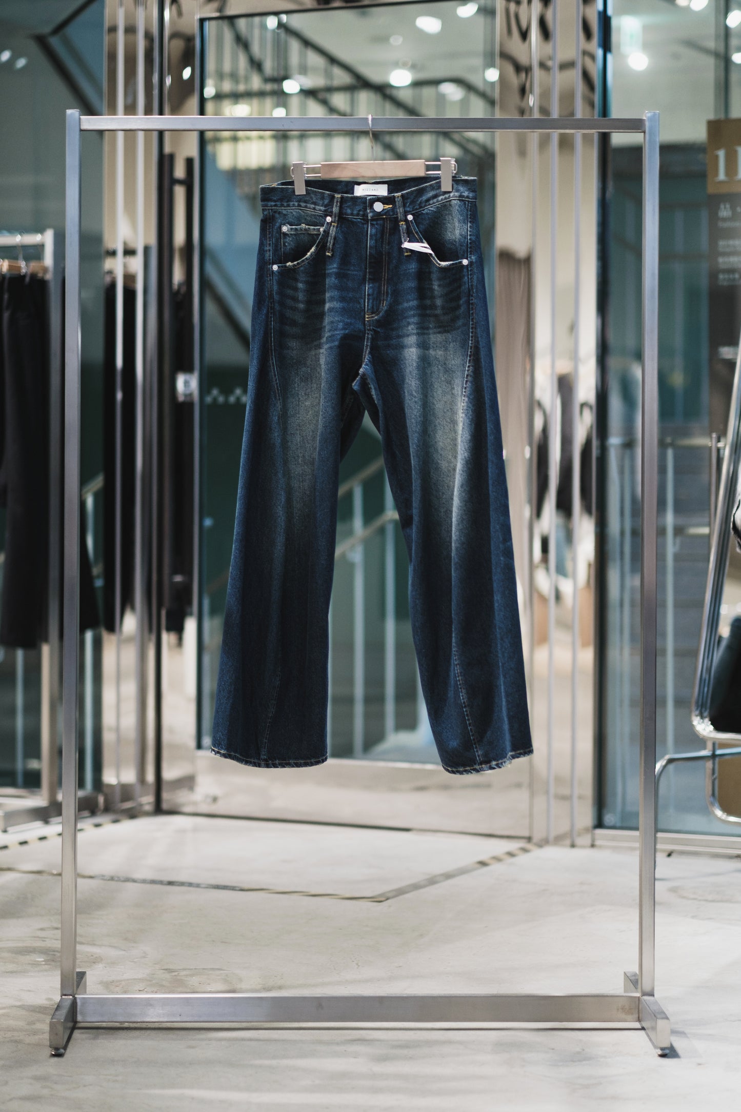 aging twisted denim pants