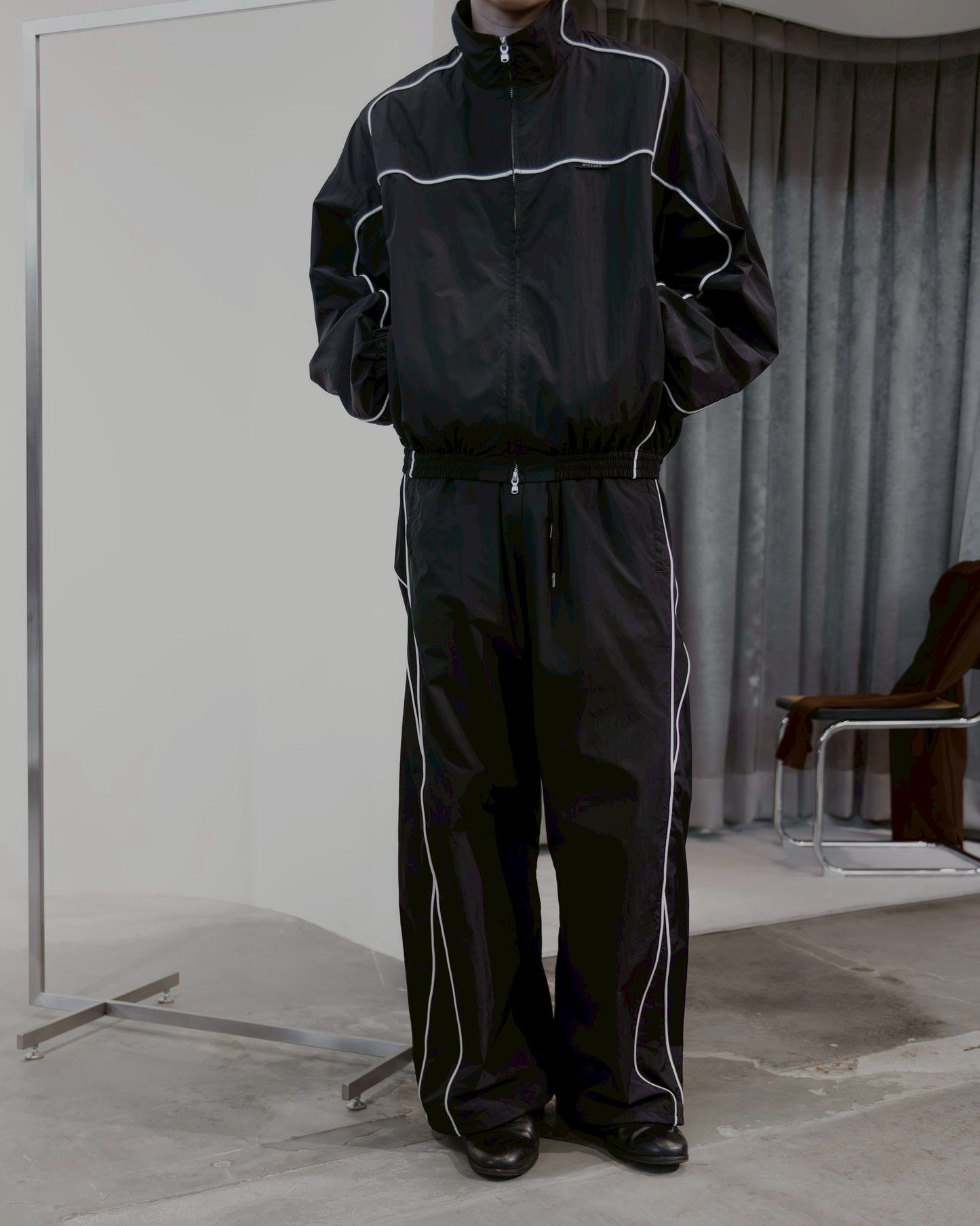 motion pleat ripstop track jacket