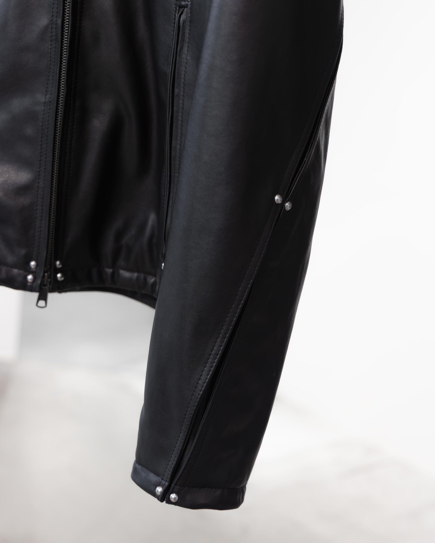 studded motion pleat leather jacket