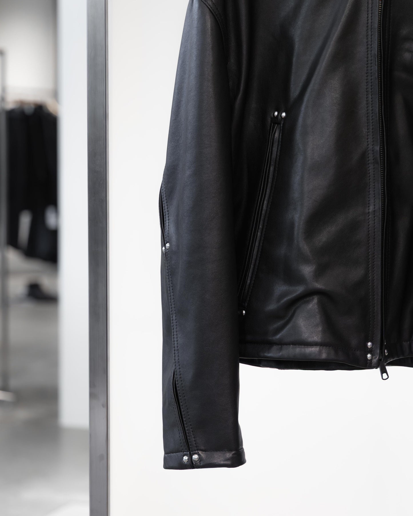 studded motion pleat leather jacket