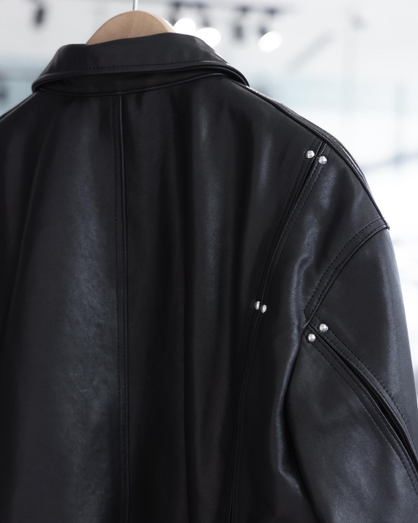 studded motion pleat leather jacket