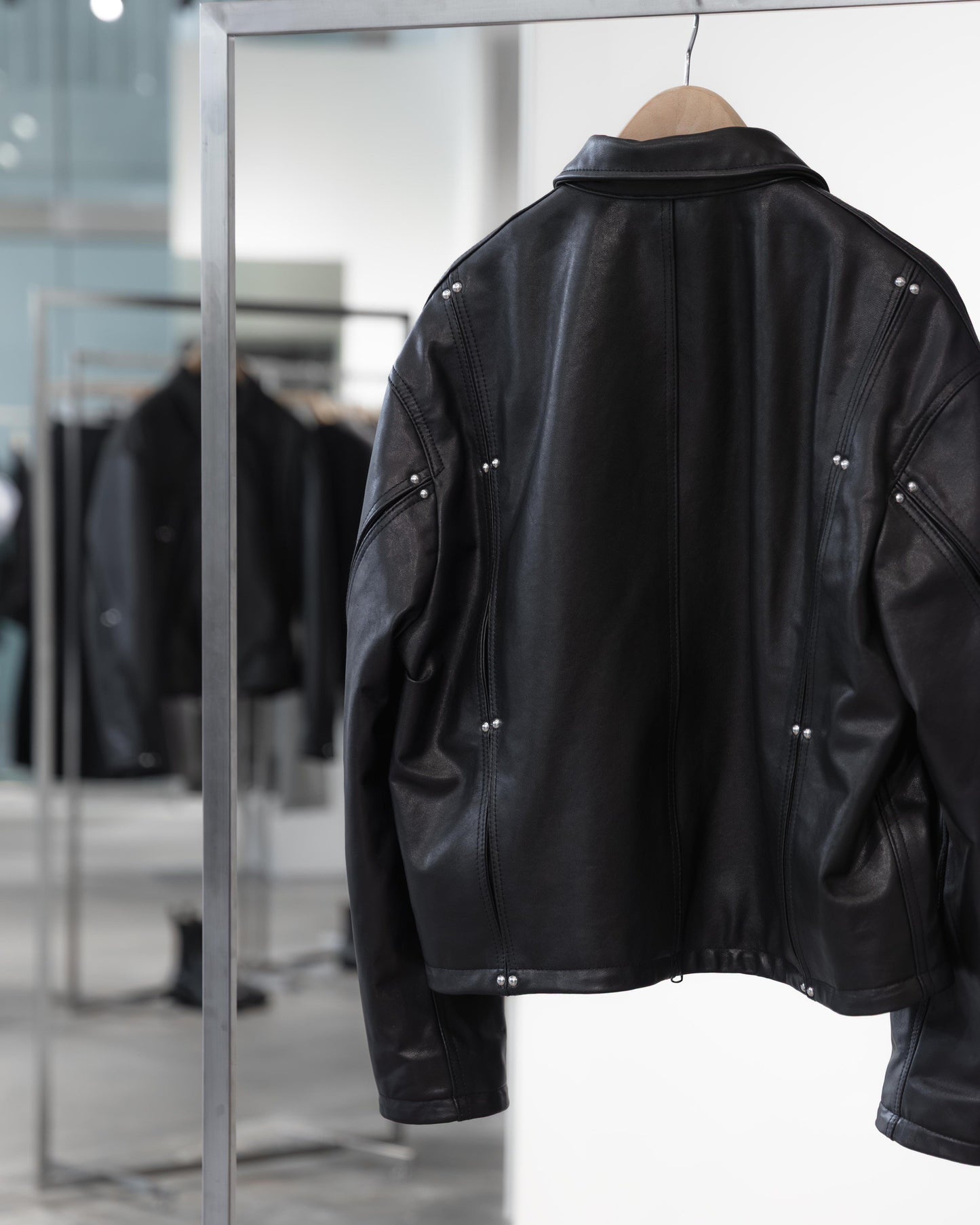 studded motion pleat leather jacket