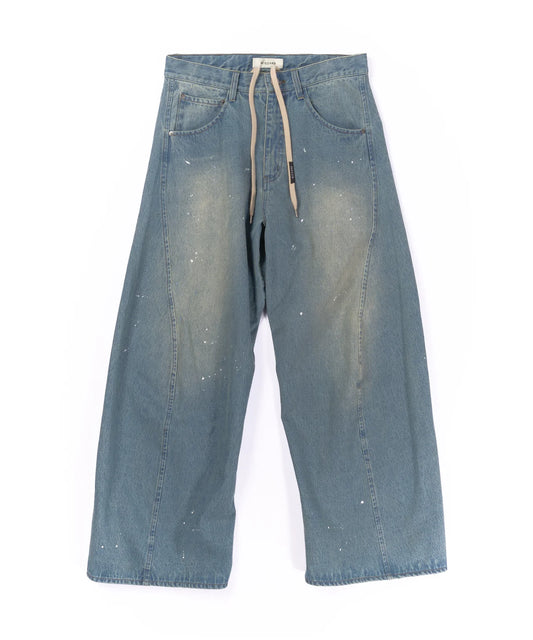 aging twisted denim pants
