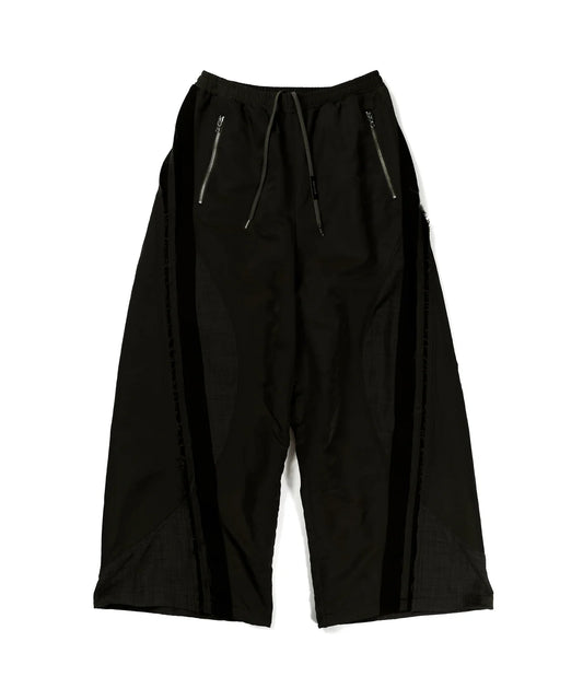 cut up track pants