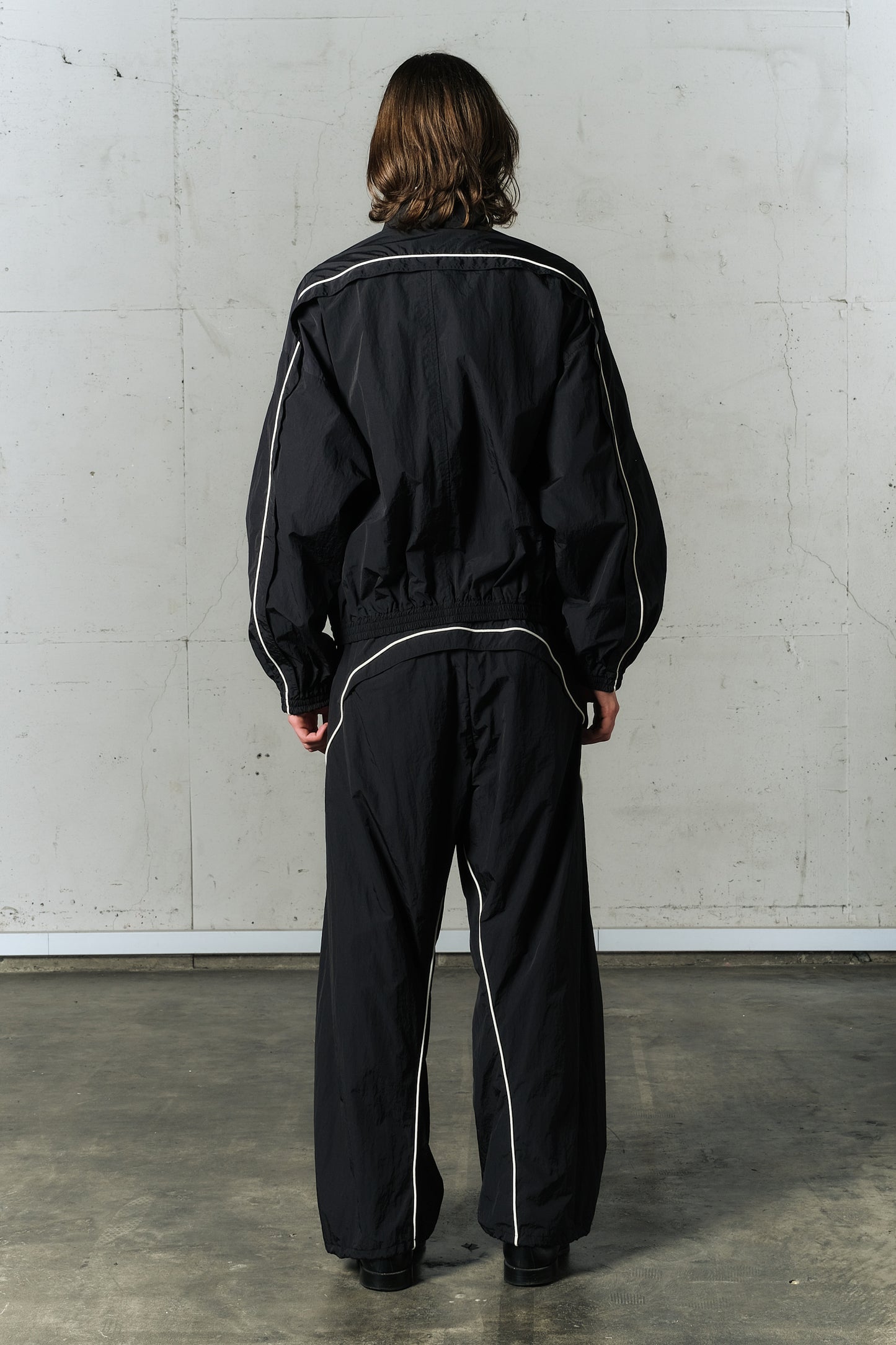 motion pleat ripstop track jacket